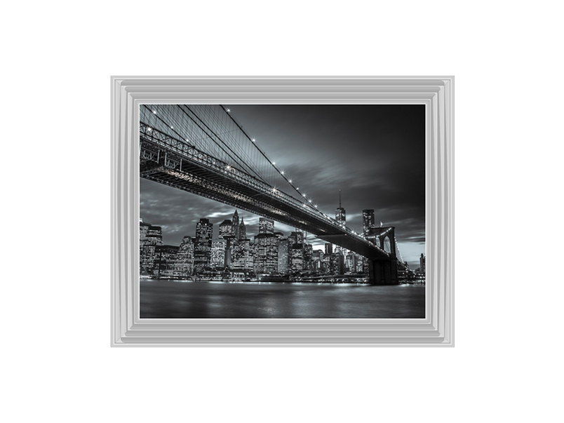 Brooklyn Bridge and lower Manhattan skyline at dusk