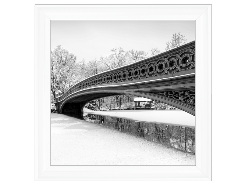 Bow Bridge snowy scene in Central Park