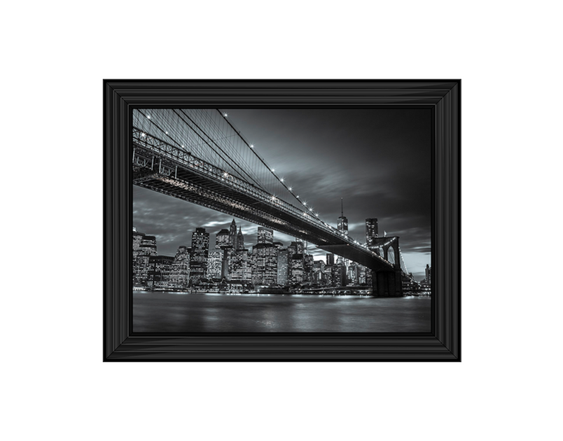 Brooklyn Bridge and lower Manhattan skyline at dusk