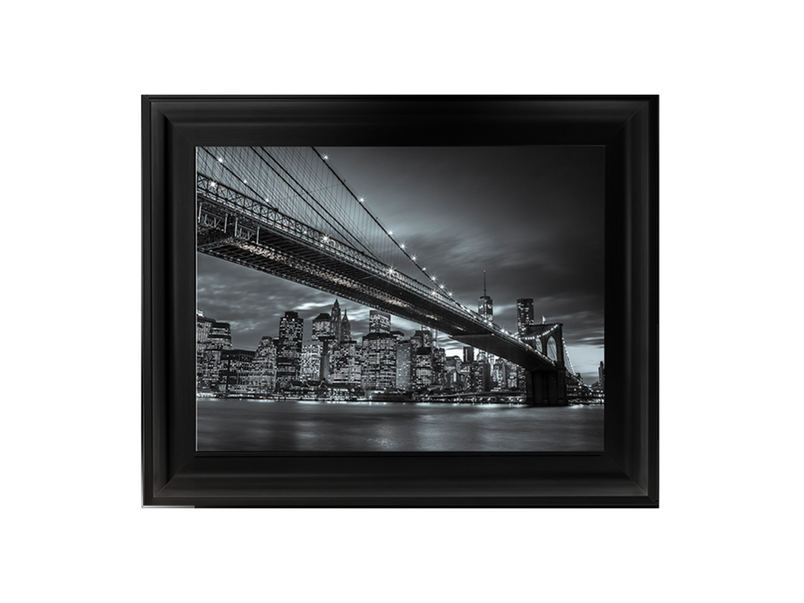 Brooklyn Bridge and lower Manhattan skyline at dusk