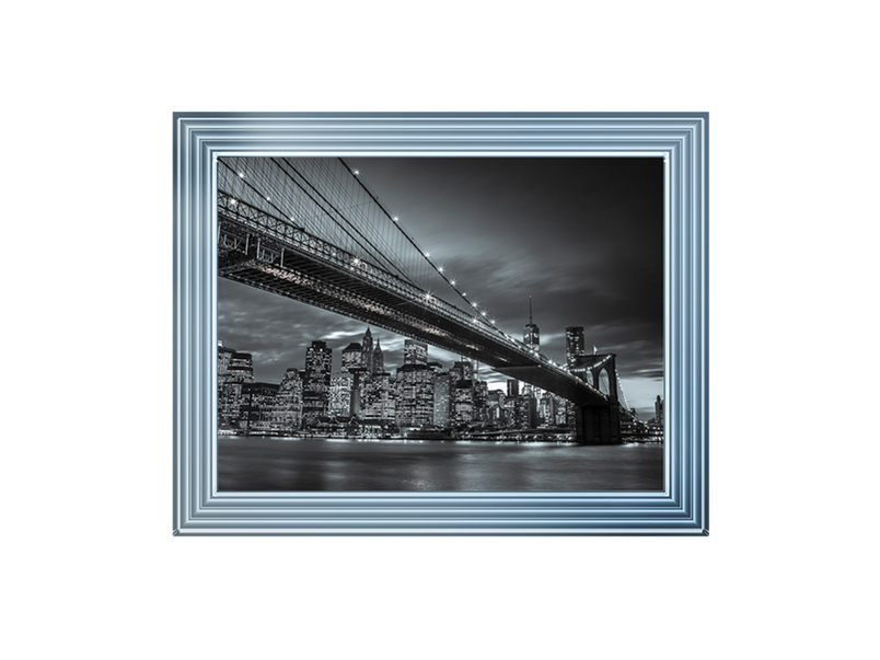 Brooklyn Bridge and lower Manhattan skyline at dusk