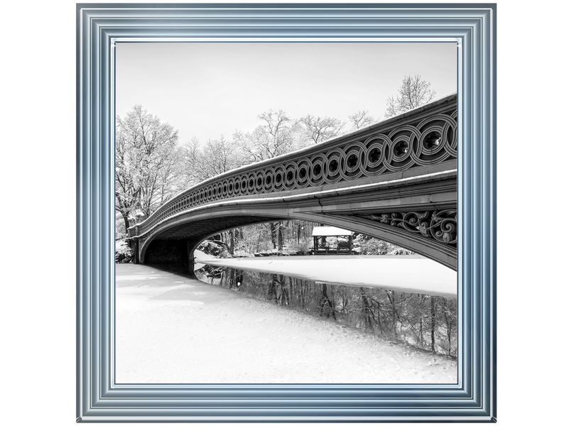 Bow Bridge snowy scene in Central Park