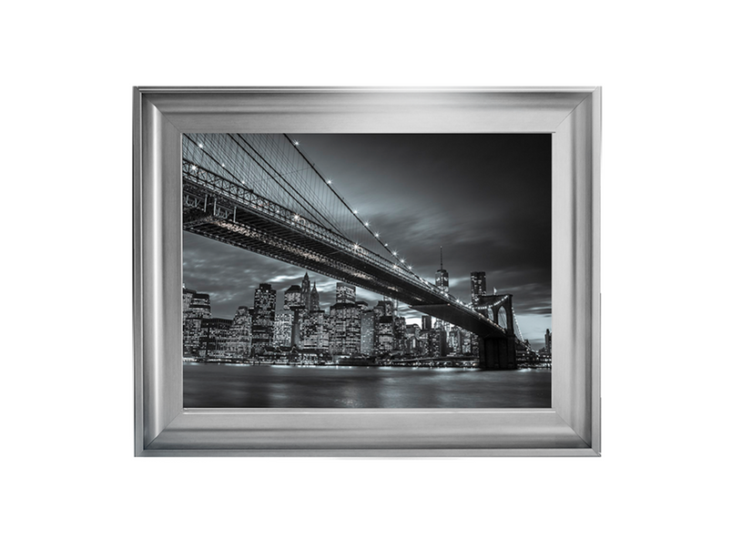 Brooklyn Bridge and lower Manhattan skyline at dusk