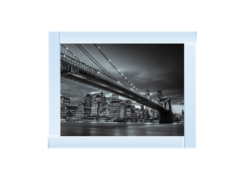 Brooklyn Bridge and lower Manhattan skyline at dusk
