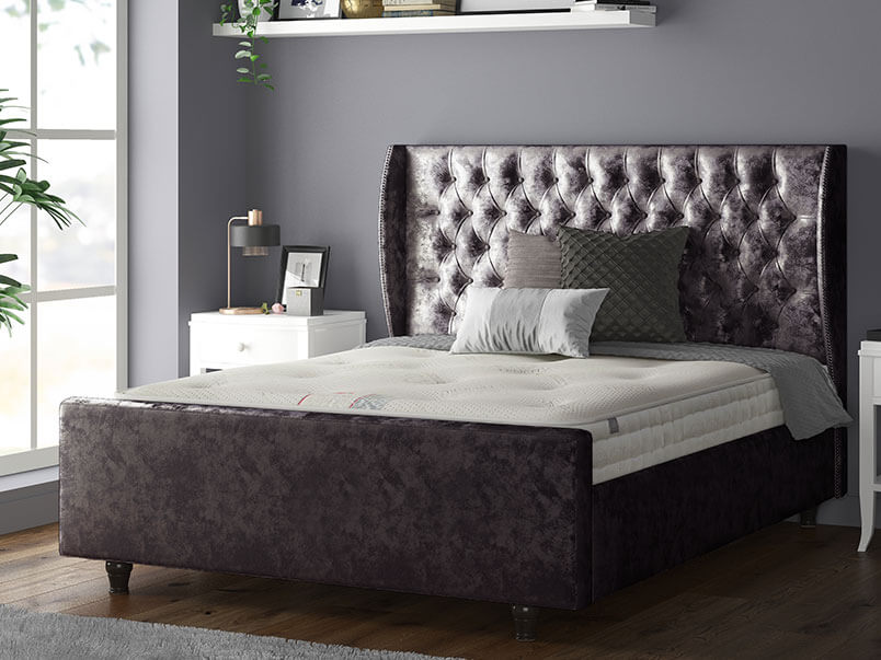 Aurora Chesterfield Wing Bed with Matching Buttons and Wooden Feet in Crushed Velvet Silver