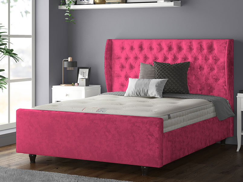 Aurora Chesterfield Wing Bed with Matching Buttons and Wooden Feet in Crushed Velvet Pink